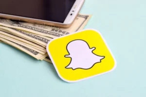 Vecteezy snapchat paper logo lies with envelope full of dollar bills 31235961 copy 300x200